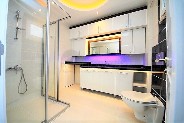 Квартира 2+1 на первой береговой линии в Махмутларе