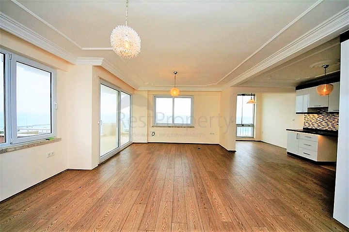 Квартира 2+1 на первой береговой линии в Махмутларе