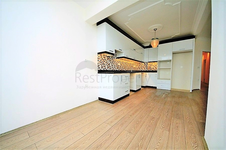 Квартира 2+1 на первой береговой линии в Махмутларе