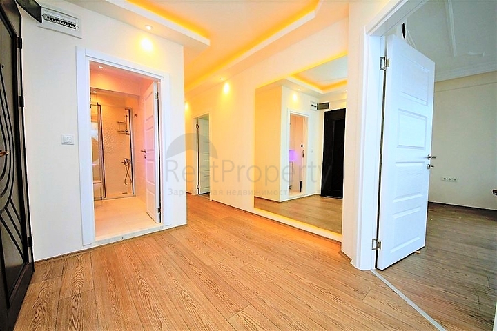 Квартира 2+1 на первой береговой линии в Махмутларе