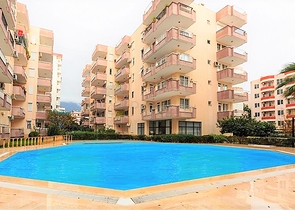 Квартира 2+1 на первой береговой линии в Махмутларе