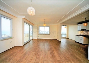 Квартира 2+1 на первой береговой линии в Махмутларе