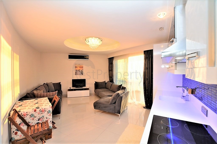 Меблированная квартира планировки 1+1 в районе Махмутлар