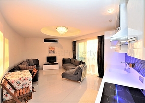 Меблированная квартира планировки 1+1 в районе Махмутлар