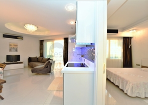 Меблированная квартира планировки 1+1 в районе Махмутлар