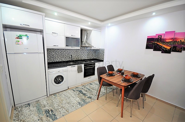 Квартира с одной спальней в Махмутларе