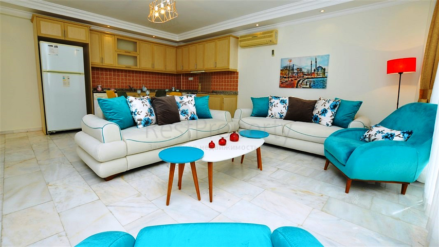 Трехкомнатная квартира с мебелью в жилом комплексе района Оба