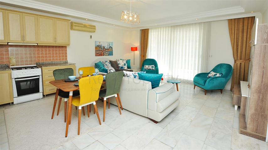Трехкомнатная квартира с мебелью в жилом комплексе района Оба