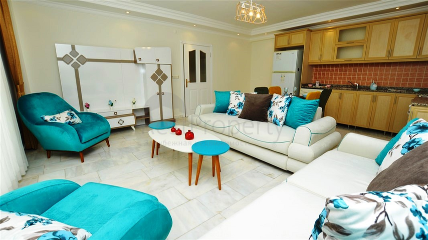 Трехкомнатная квартира с мебелью в жилом комплексе района Оба