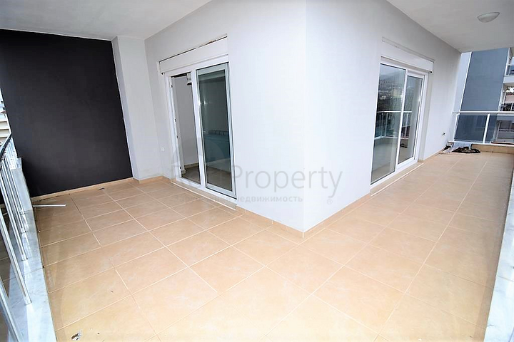 Просторная квартира с одной спальней в Махмутларе