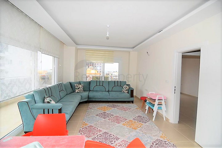 Просторная квартира с одной спальней в Махмутларе