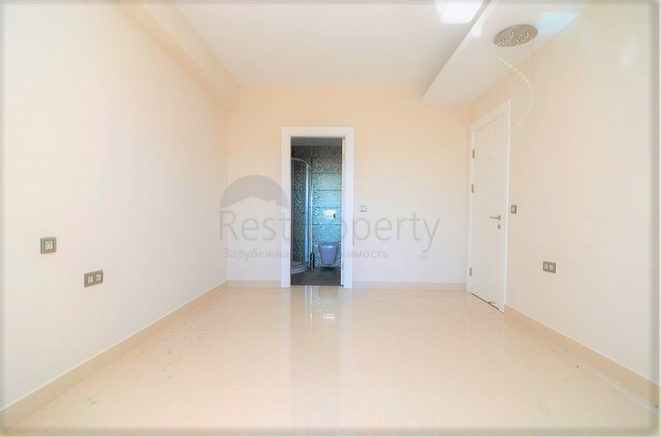 Квартира с двумя спальными комнатами в районе Махмутлар