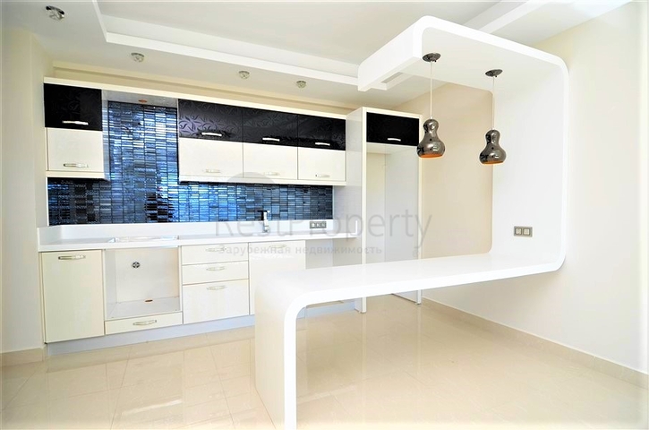 Квартира с двумя спальными комнатами в районе Махмутлар