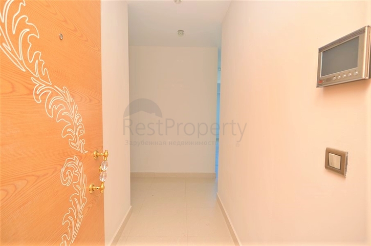 Двухкомнатная квартира с видом на море в Махмутларе