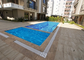 Квартиры с 2 и 4 спальнями в Гюзельоба Лара