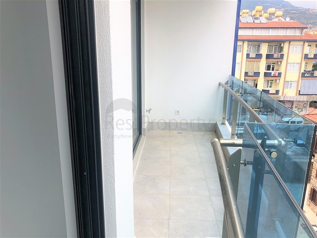 Квартира с одной спальней в элитном комплексе в центре Алании