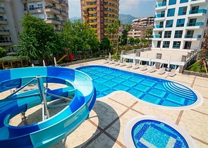 Квартира с одной спальней в элитном комплексе в центре Алании