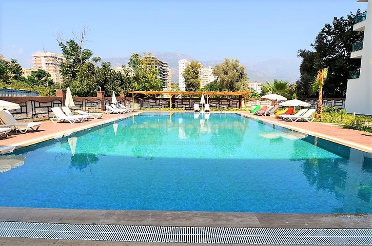 Меблированная квартира с одной спальней в Махмутларе