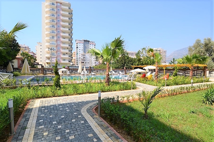 Меблированная квартира с одной спальней в Махмутларе