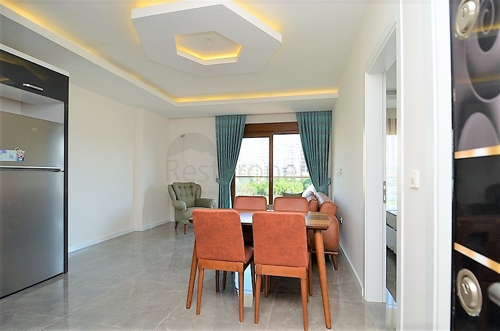 Меблированная квартира с одной спальней в Махмутларе