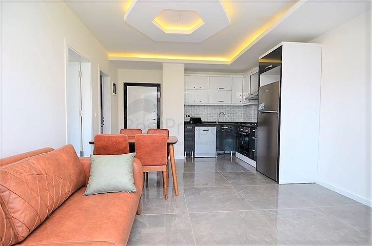 Меблированная квартира с одной спальней в Махмутларе