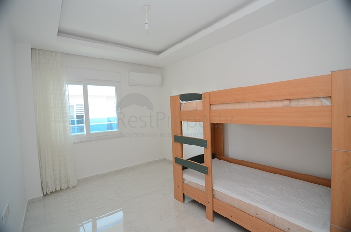 Меблированный пентхаус с тремя спальнями в Махмутларе