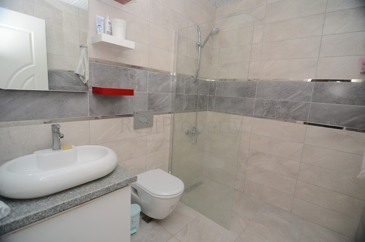 Меблированный пентхаус с тремя спальнями в Махмутларе