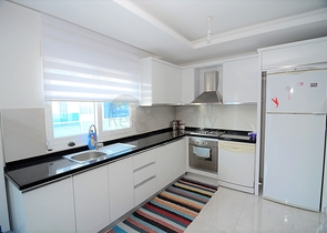 Меблированный пентхаус с тремя спальнями в Махмутларе