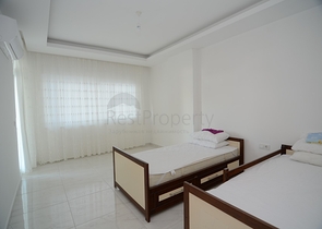 Меблированный пентхаус с тремя спальнями в Махмутларе