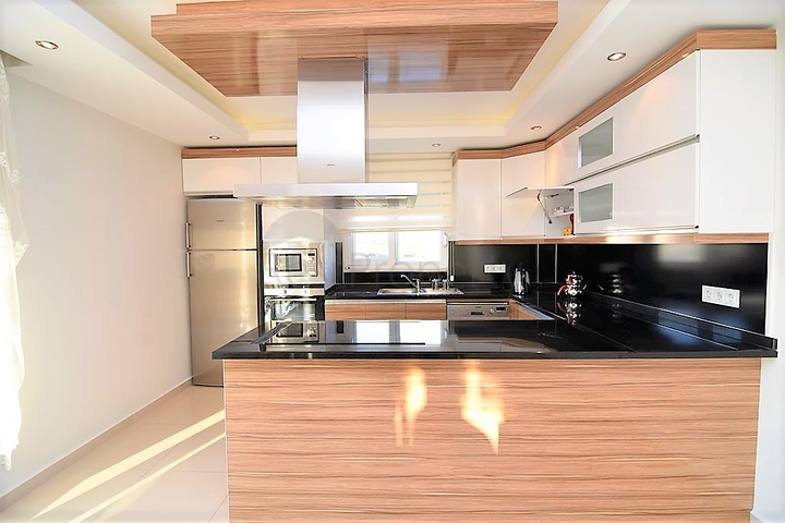 Меблированный пентхаус с видом на море в Махмутларе