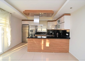 Меблированный пентхаус с видом на море в Махмутларе