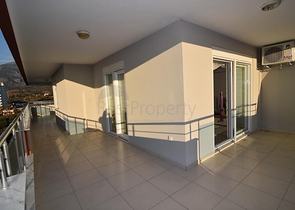 Меблированный пентхаус с видом на море в Махмутларе