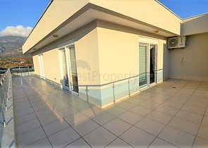 Меблированный пентхаус с видом на море в Махмутларе