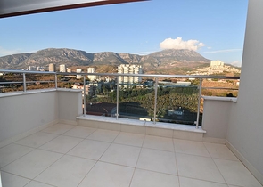 Меблированный пентхаус с видом на море в Махмутларе