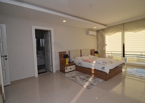 Меблированный пентхаус с видом на море в Махмутларе