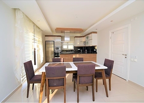 Меблированный пентхаус с видом на море в Махмутларе