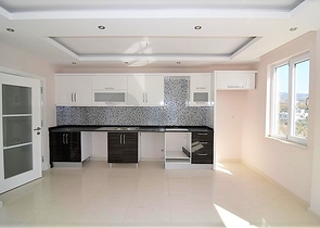 Трехкомнатная квартира в благоустроенном комплексе Махмутлара