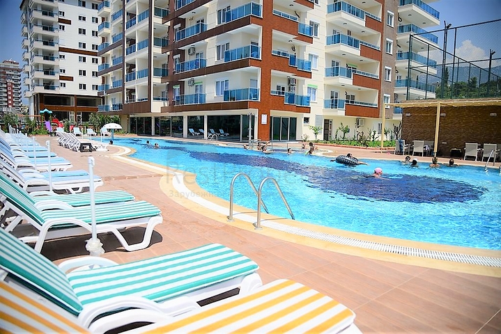 Квартира с одной спальной комнатой в районе Махмутлар