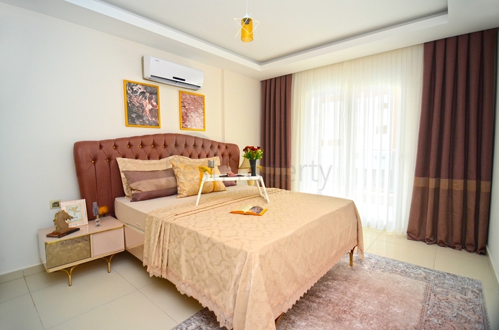 Квартира с одной спальной комнатой в районе Махмутлар