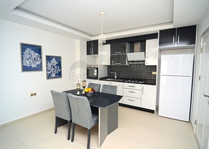 Квартира с одной спальной комнатой в районе Махмутлар