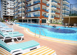 Квартира с одной спальной комнатой в районе Махмутлар