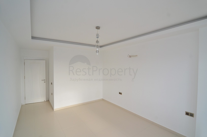 Двухкомнатная квартира по выгодной цене в Махмутларе