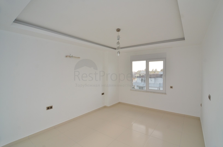 Двухкомнатная квартира по выгодной цене в Махмутларе