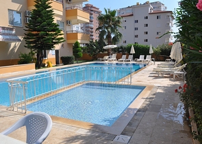 Просторная квартира с двумя спальными комнатами в Махмутларе