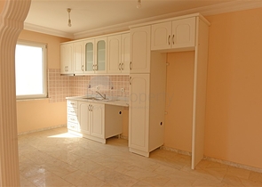 Просторная квартира с двумя спальными комнатами в Махмутларе