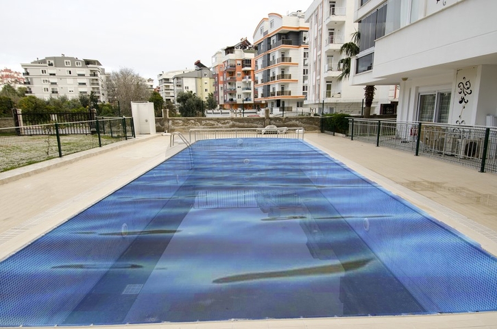 Двухкомнатная квартира по доступной цене в районе Коньяалты 