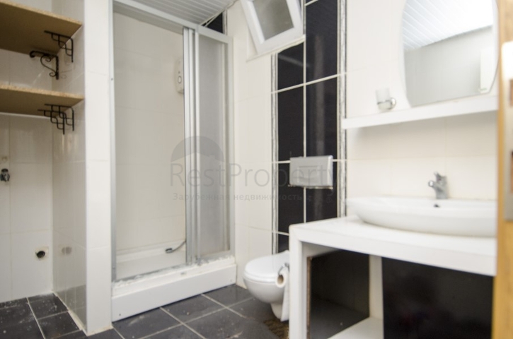 Двухкомнатная квартира по доступной цене в районе Коньяалты 