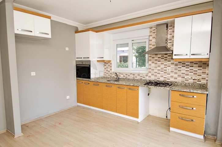 Двухкомнатная квартира по доступной цене в районе Коньяалты 