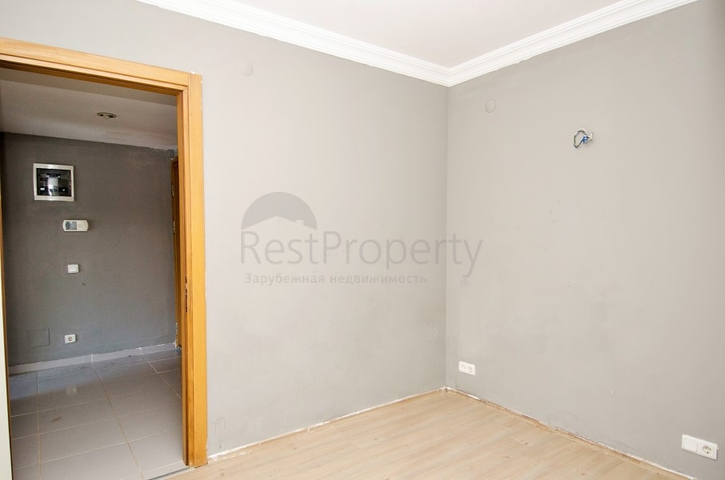 Двухкомнатная квартира по доступной цене в районе Коньяалты 