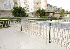 Двухкомнатная квартира по доступной цене в районе Коньяалты 